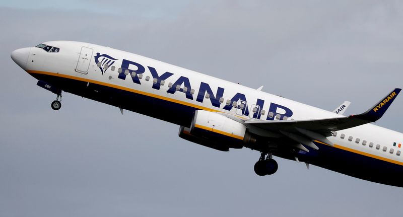 FILE PHOTO: A Ryanair plane takes off from Manchester Airport