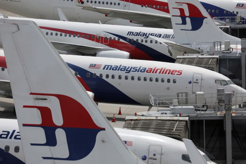 FILE PHOTO: Malaysia Airlines planes are seen parked at Kuala