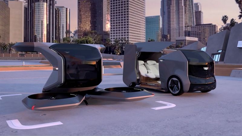 Two futuristic Cadillac concepts are seen in a still image