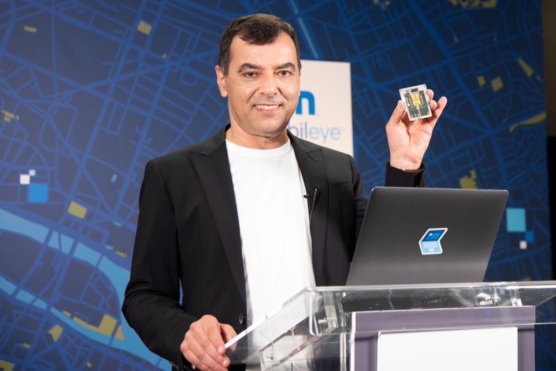 Handout image of Mobileye CEO Amnon Shashua holding a lidar