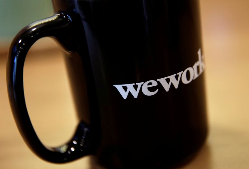 FILE PHOTO: The WeWork logo is seen on a cup