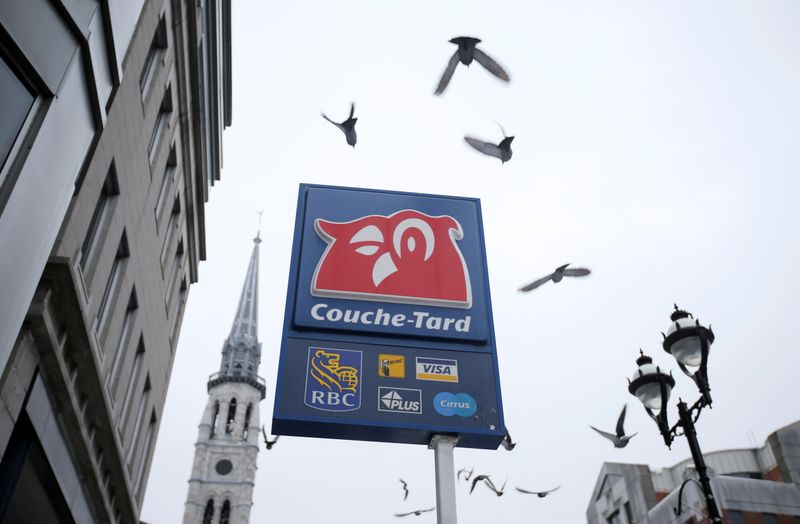 The logo of a Couche-Tard convenience store is seen in