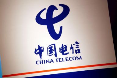 FILE PHOTO: The company logo of China Telecom is displayed