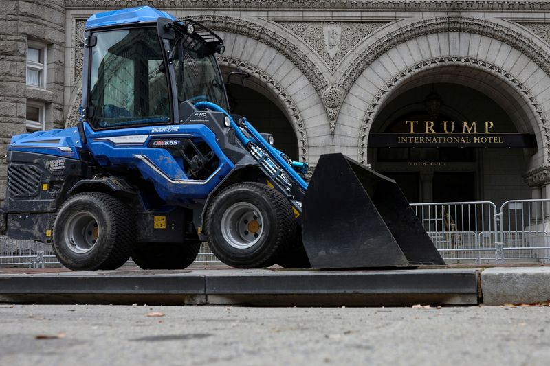 FILE PHOTO: A construction dump truck sits unattended outside Trump