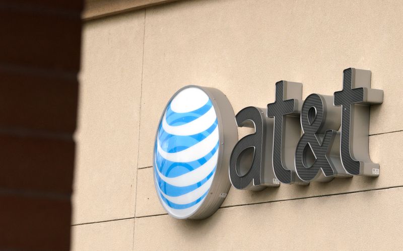 The AT&T logo is seen on a store in Golden,