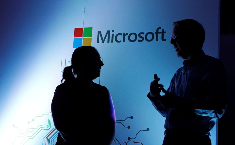 Microsoft Corporate Vice President Michael Fortin talks to a delegate