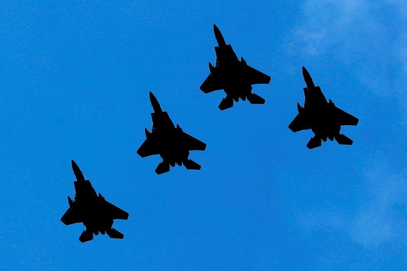 U.S. Air Force F-15 fighter jets fly in formation during