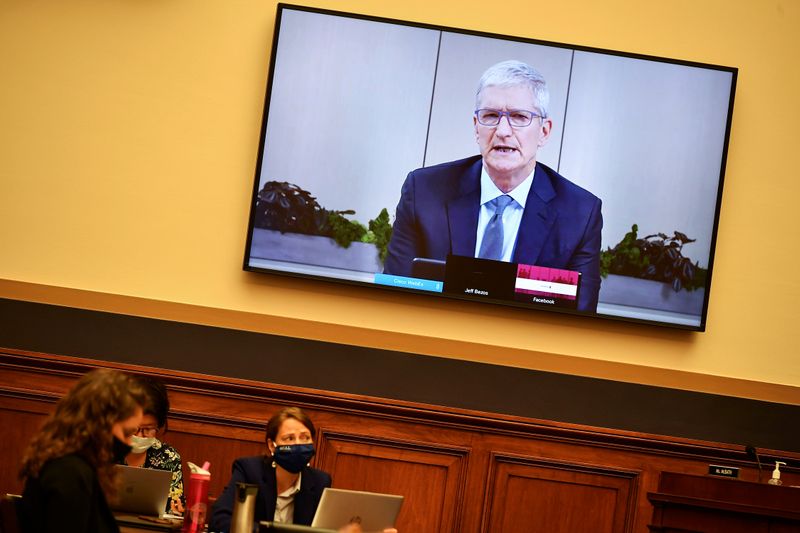 FILE PHOTO: Apple CEO Tim Cook testifies before the House