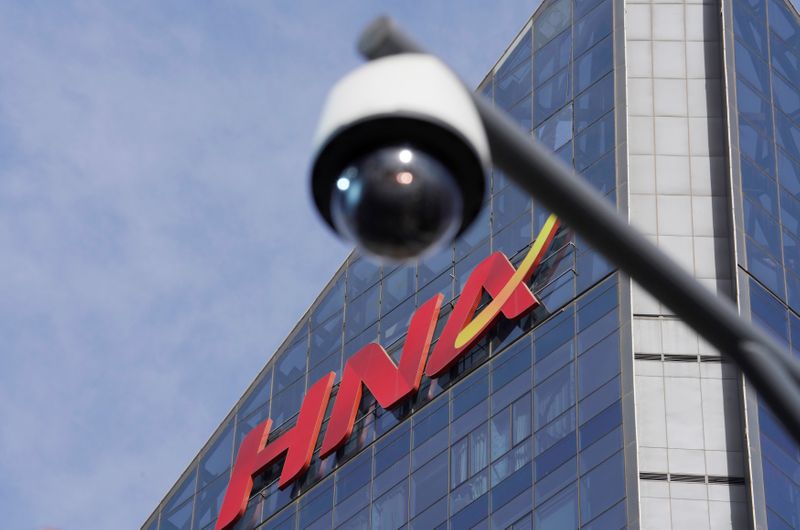 A HNA Group logo is seen on the building of