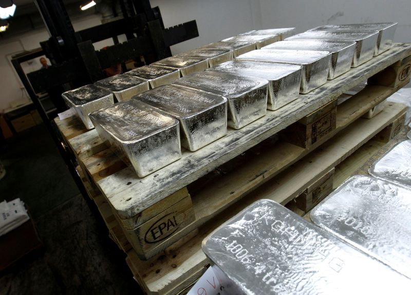 FILE PHOTO: Bars of silver are placed on wooden pallets