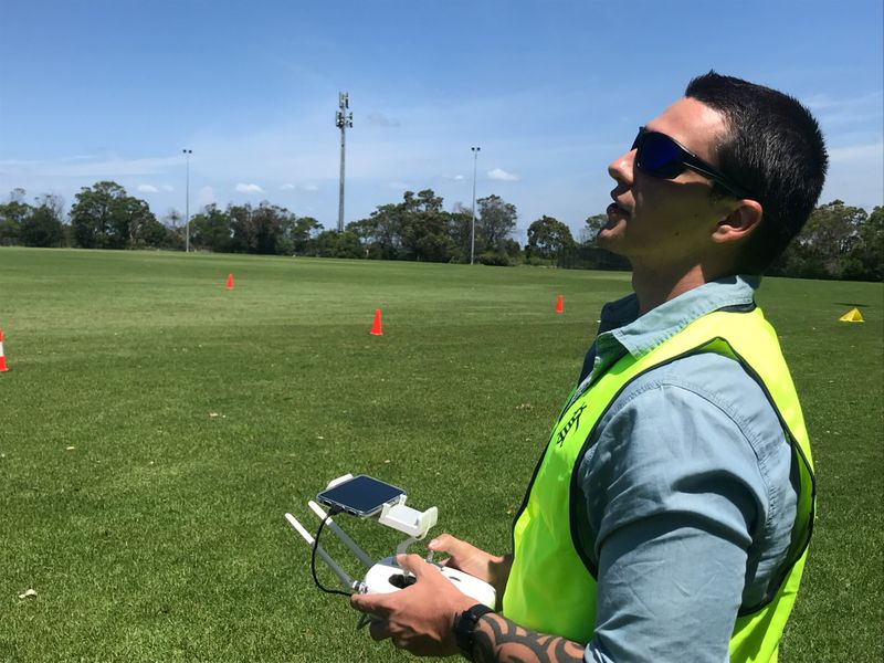Sebastian Litchfield flies a drone during a course to obtain