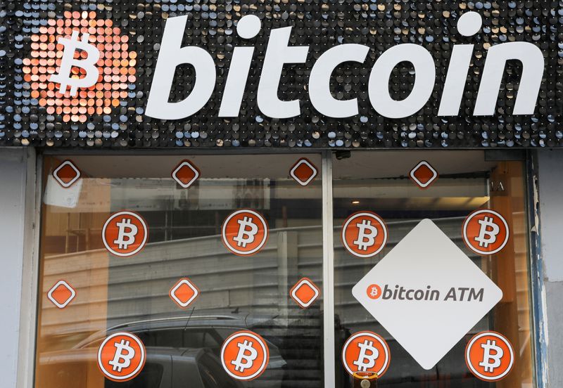 FILE PHOTO: A Bitcoin digital currency ATM shop is seen