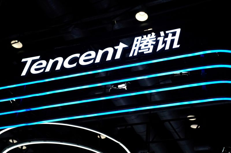 FILE PHOTO: Logo of Tencent is seen at its booth
