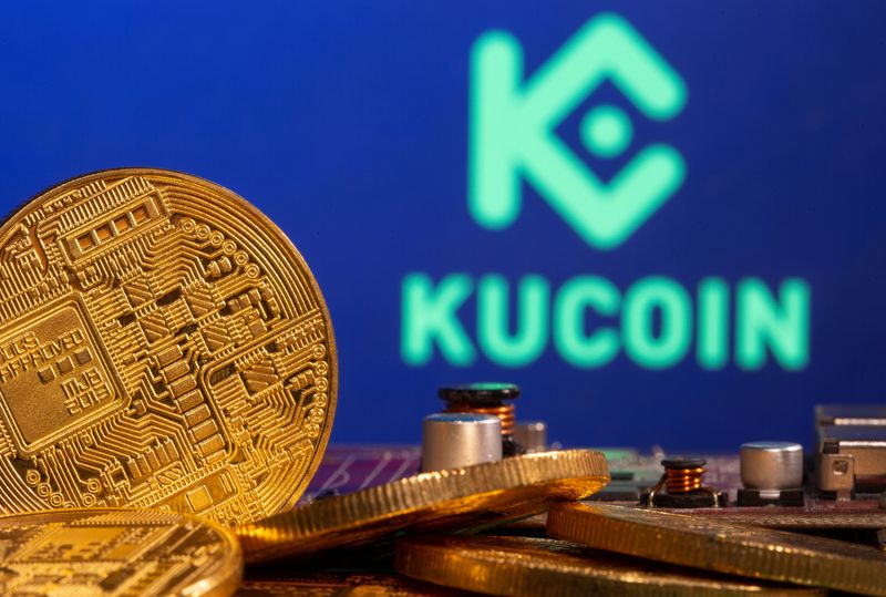 Representations of cryptocurrency is seen in front of a Kucoin