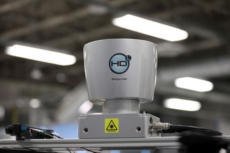 A Velodyne Lidar sensor is seen on an autonomous vehicle