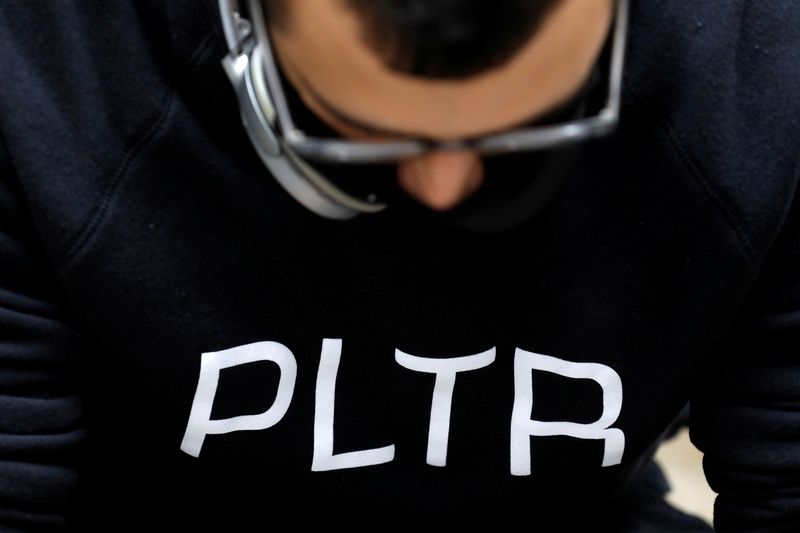 FILE PHOTO: A person wears a Palantir Technologies (PLTR) sweater