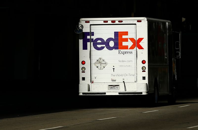 A Federal Express truck on delivery is pictured in downtown