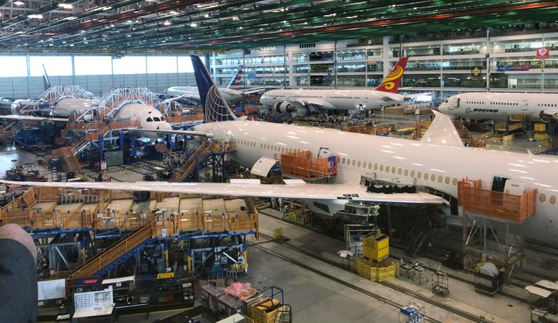 Boeing 787 Dreamliners are shown in final production at widebody