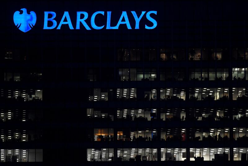 FILE PHOTO: Workers are seen at Barclays bank offices in