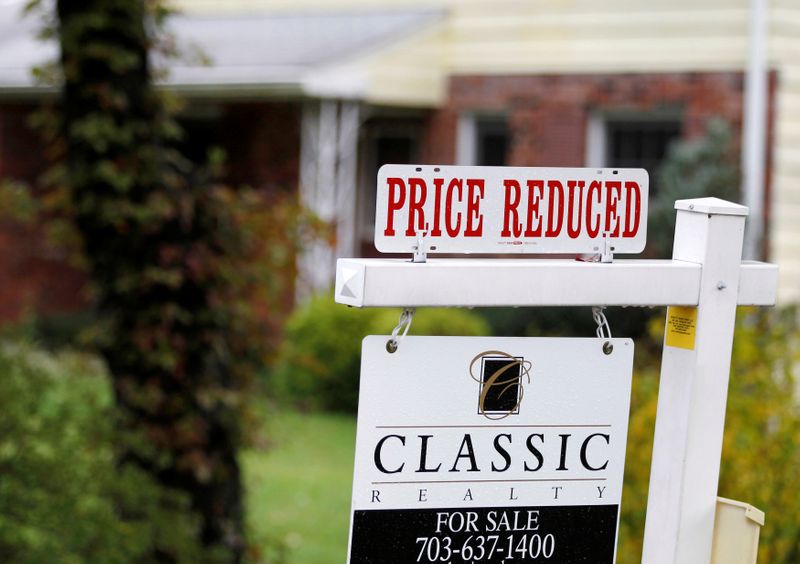 FILE PHOTO: A “Price Reduced” sign is displayed on a