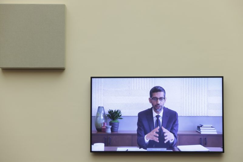 Google CEO Sundar Pichai speaks via video conference before the