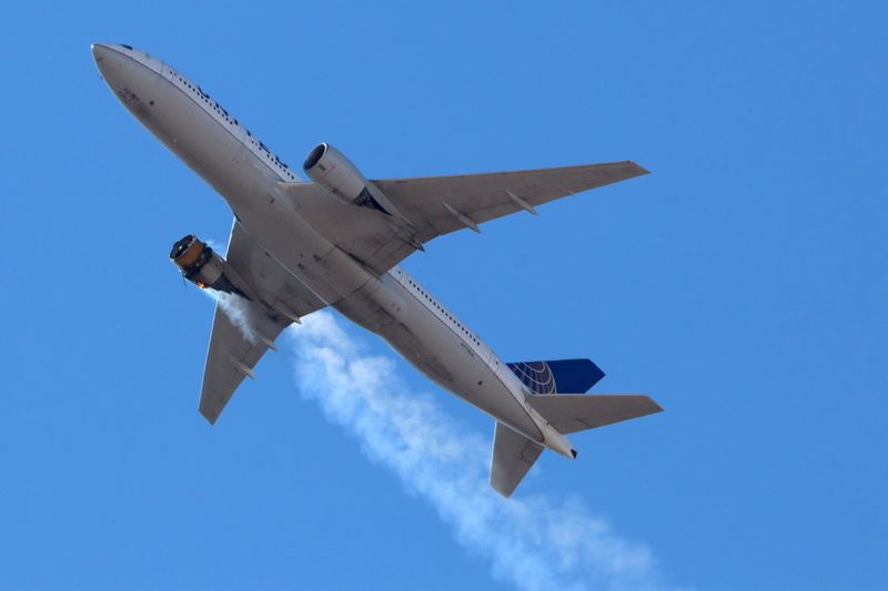 FILE PHOTO: United Airlines flight UA328 returns to Denver International