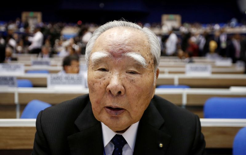 FILE PHOTO: Suzuki Motor Chairman Osamu Suzuki attends the Global