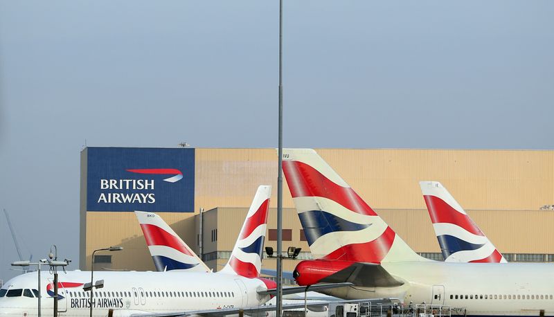 British Airways aircraft are seen at Heathrow Airport in west