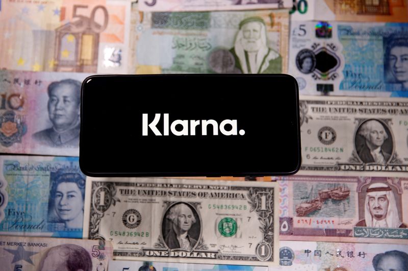 FILE PHOTO: A smartphone displays a Klarna logo on top