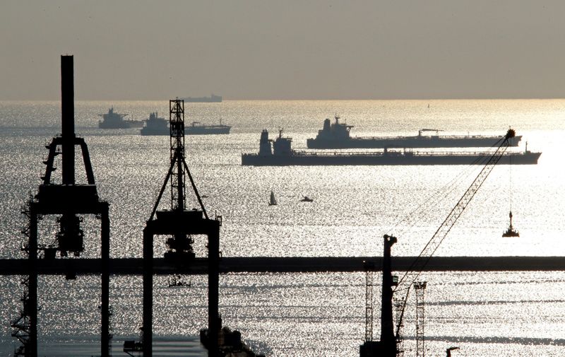 FILE PHOTO: Oil and gas tankers are anchored off the