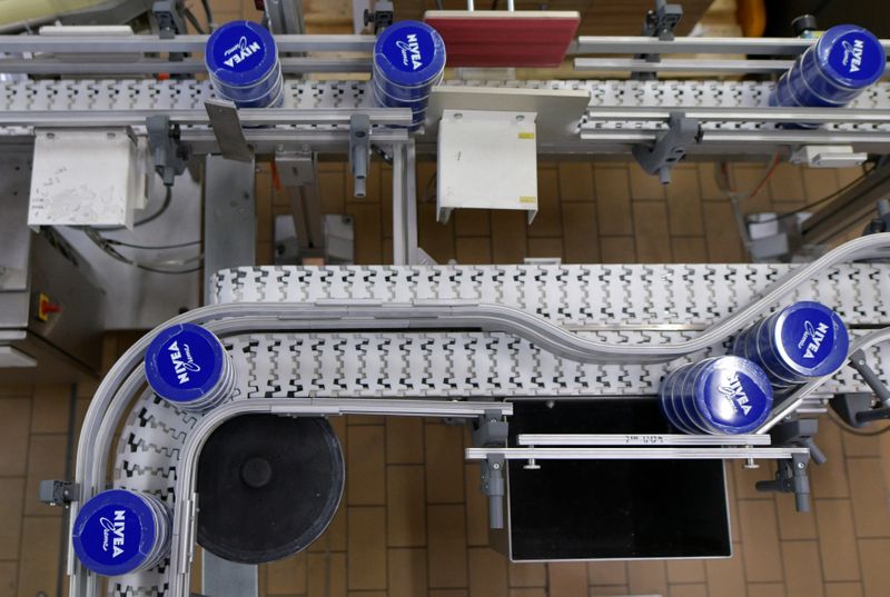 Nivea tins are seen in a production line at the