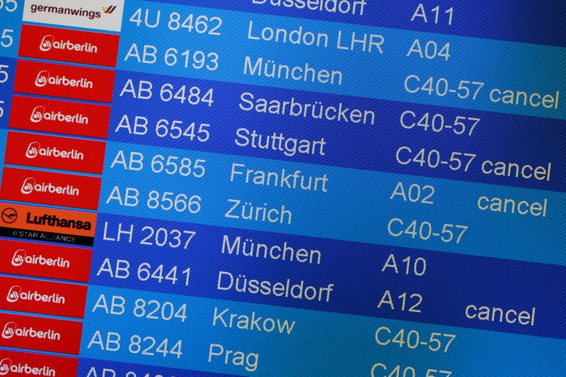 FILE PHOTO: Board shows canceled Air Berlin flights at Tegel