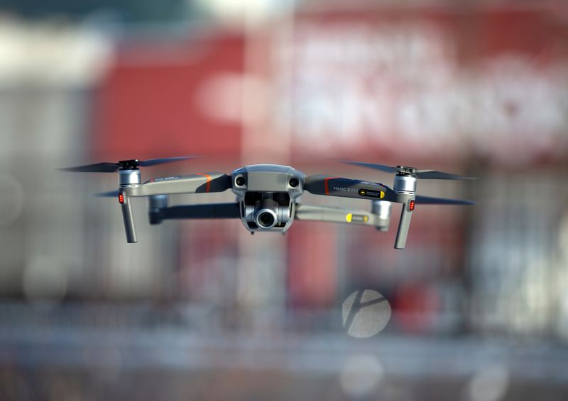 FILE PHOTO: A drone flies as Chinese drone maker DJI