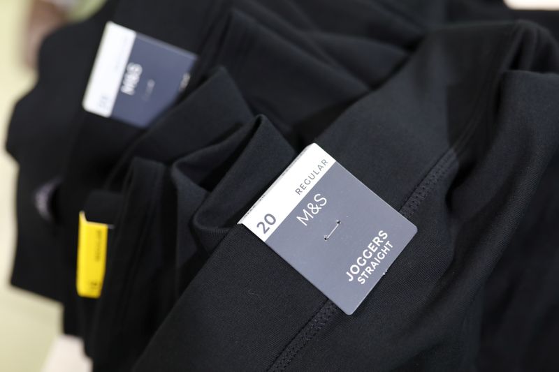 Marks and Spencer (M&S) tags are seen on joggers made