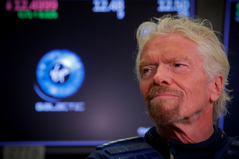 FILE PHOTO: Sir Richard Branson stands on the floor of