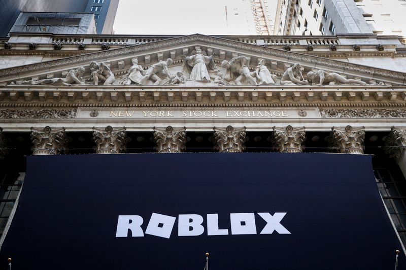 The Roblox logo is displayed on a banner, to celebrate