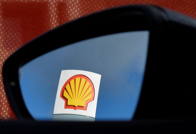 FILE PHOTO: A Shell logo is seen reflected in a