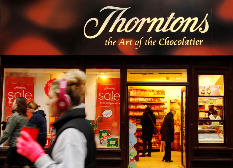 FILE PHOTO: Customers shop inside Thorntons chocolate shop on Oxford