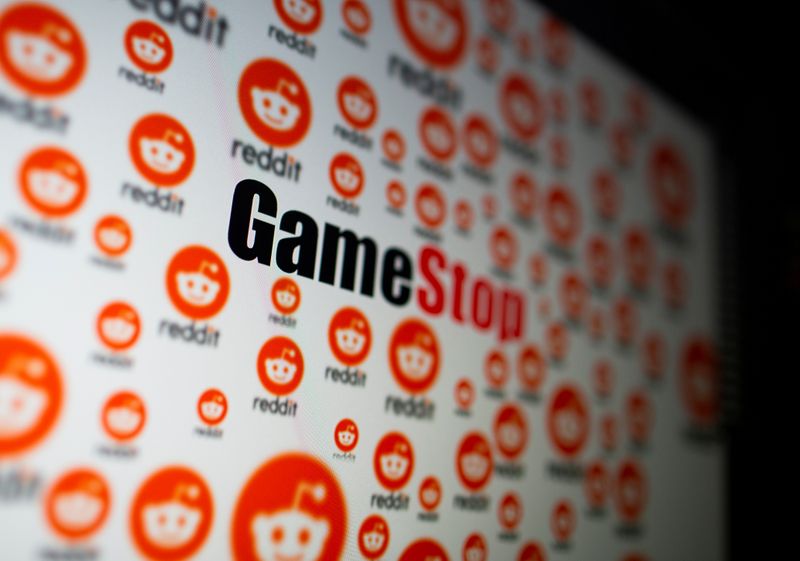 FILE PHOTO: GameStop and Reddit logos are seen displayed in