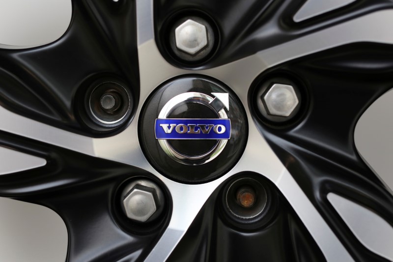 A Volvo logo is seen on a rim displayed at
