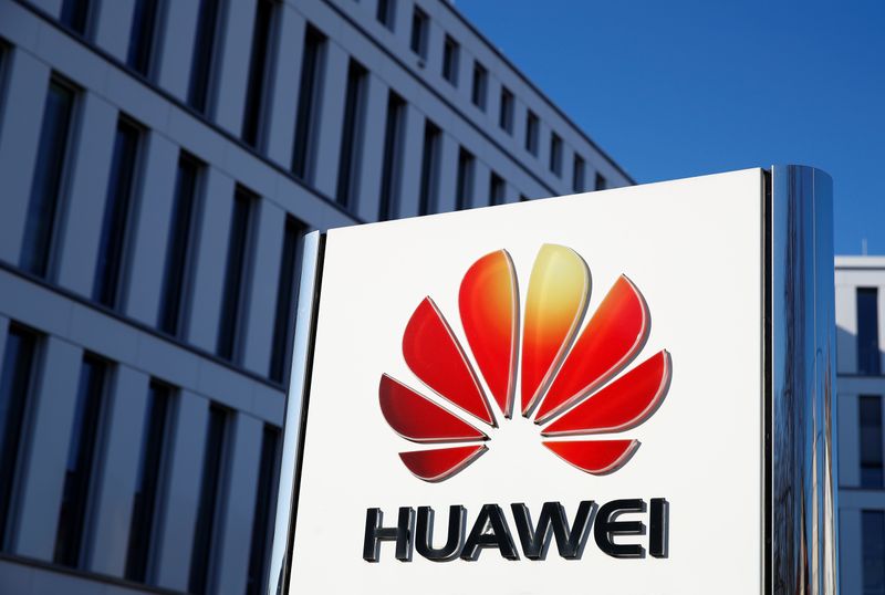 The logo of Huawei Technologies is pictured in front of
