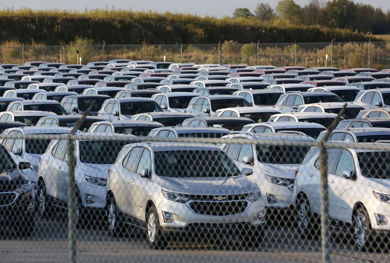FILE PHOTO: Chevrolet Equinox SUVs are parked awaiting shipment near
