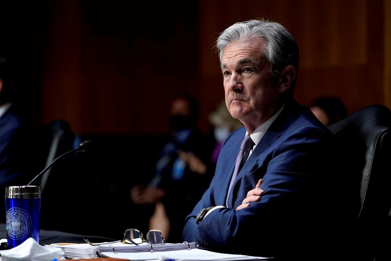 FILE PHOTO: Chair of the Federal Reserve Jerome Powell listens