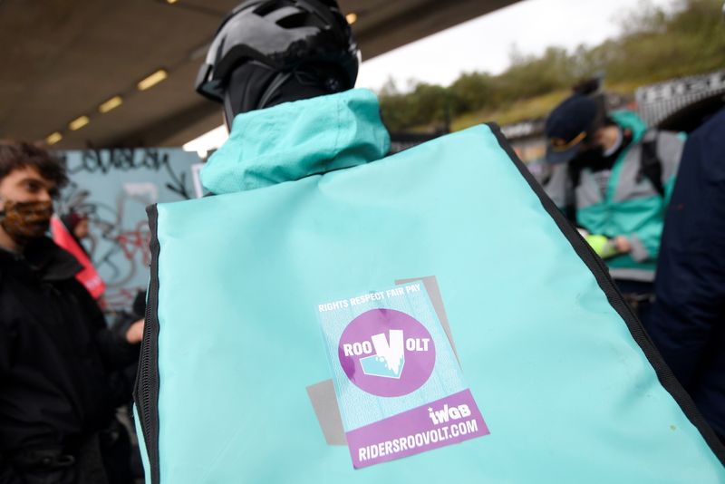 Deliveroo riders demonstrate to push for improved working conditions, in