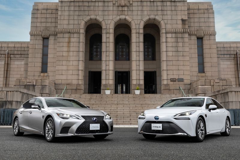 Lexus LS and Toyota Mirai cars in front of the