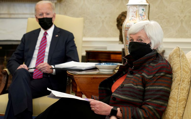 FILE PHOTO: U.S. President Joe Biden receives economic briefing with