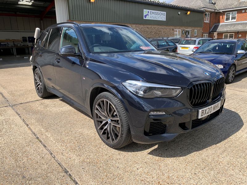 A BMW X5 plug-in hybrid is pictured while undergoing tests