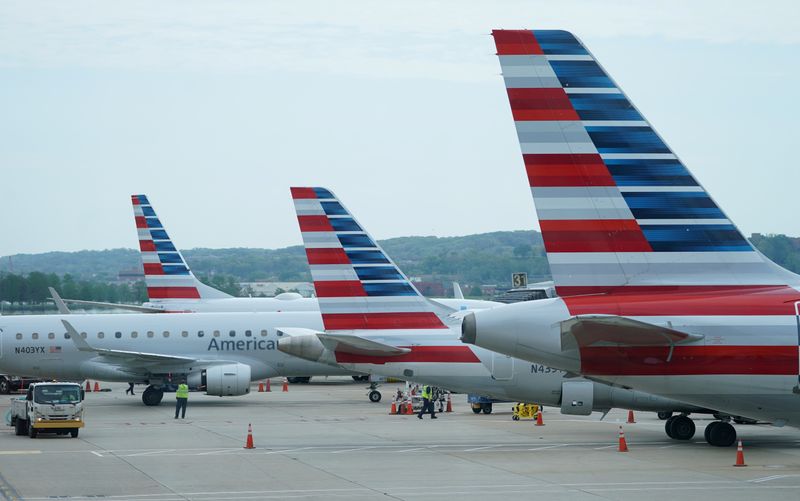 FILE PHOTO: FILE PHOTO: American Airlines jets sit at gates