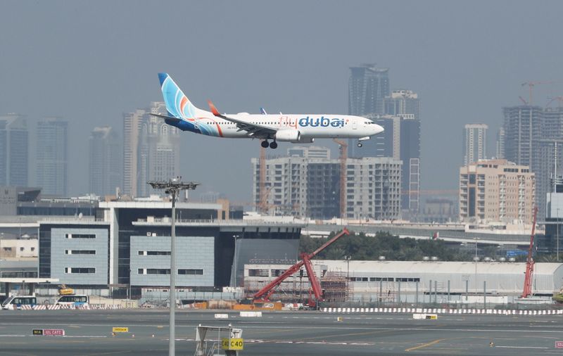 FILE PHOTO: A Fly Dubai Boeing 737 airplane approaches for