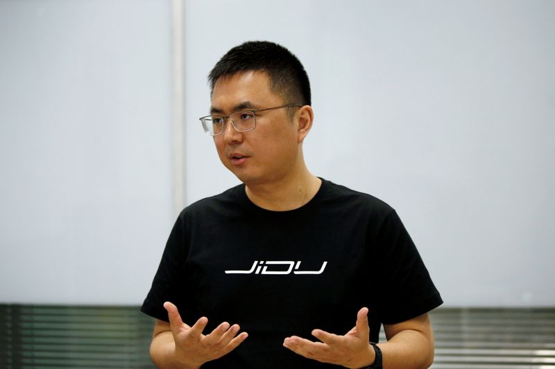 Jidu Auto CEO Xia Yiping attends an interview with Reuters
